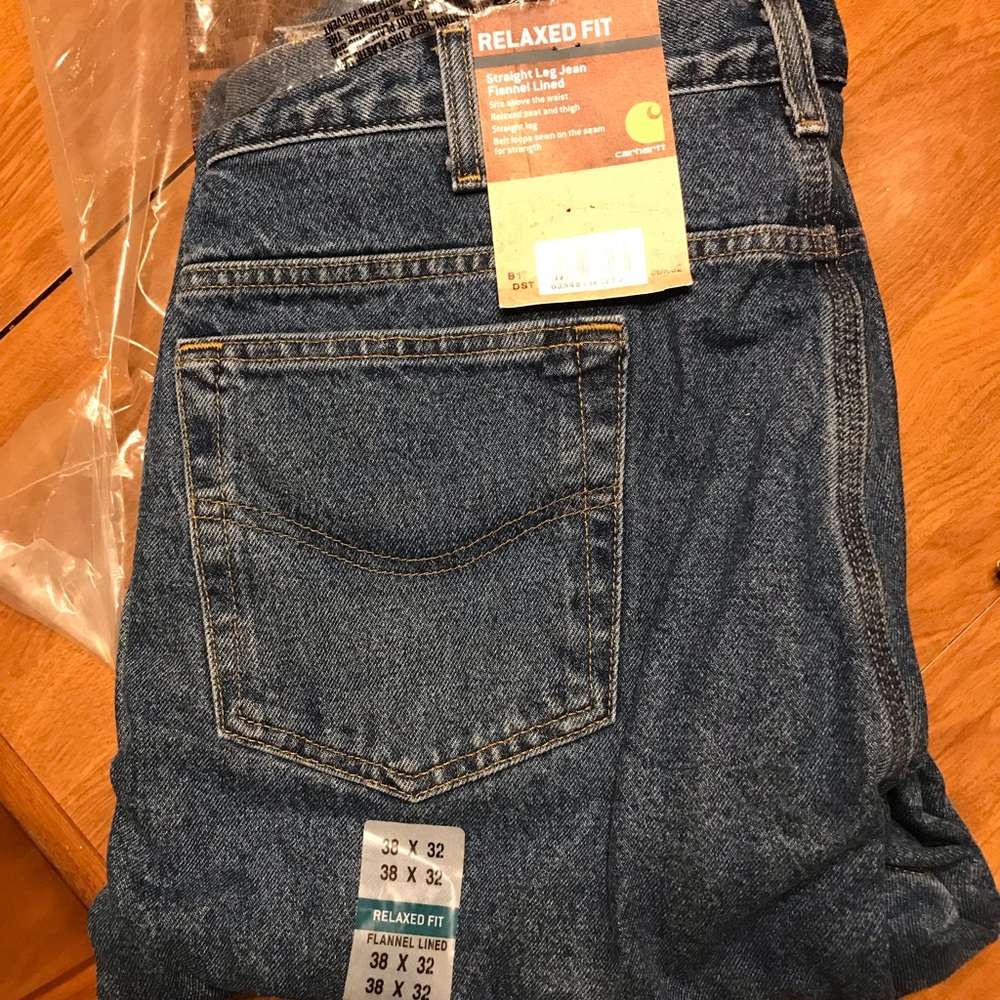 Brand new Carrhart mens jeans, with warm flannel lining.